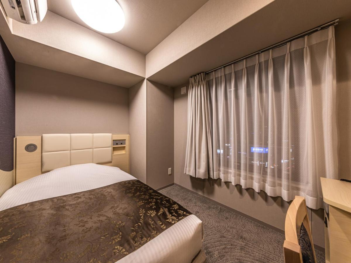 Apa Hotel Shin Osaka Eki Tower Buitenkant foto