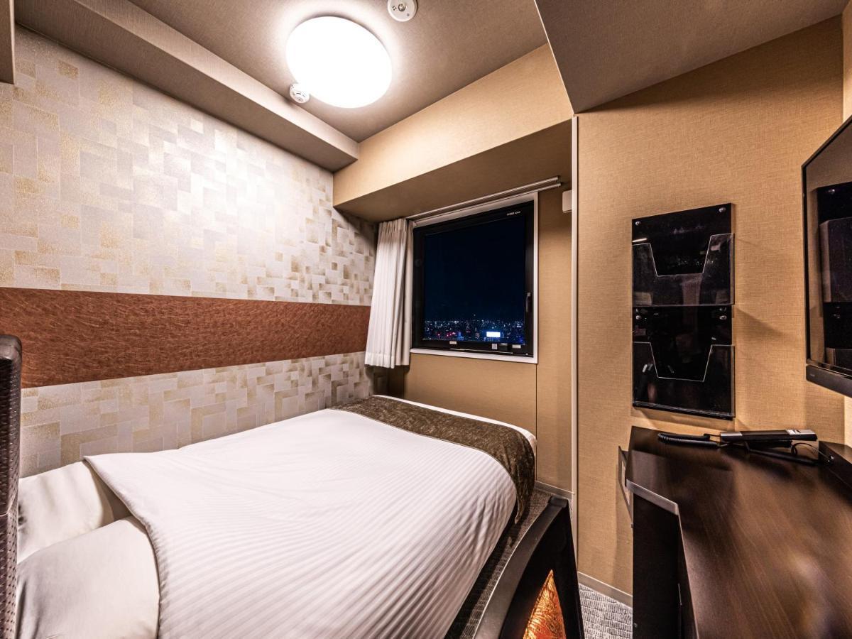 Apa Hotel Shin Osaka Eki Tower Buitenkant foto
